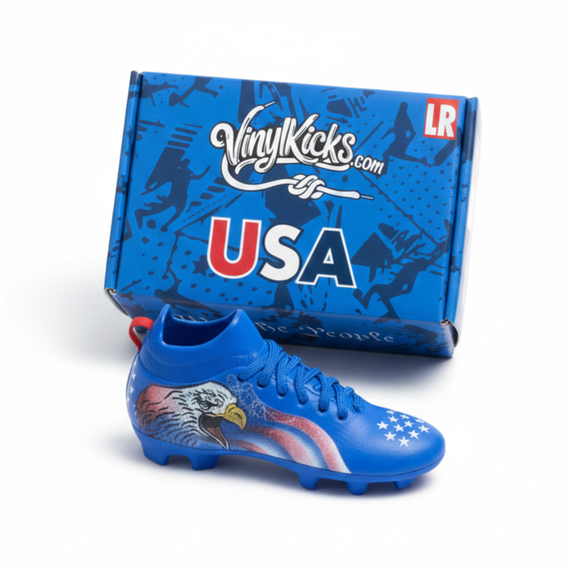 Blue soccer shoe with eagle design and 'USA' text next to a blue 'VinylKicks.com' box.