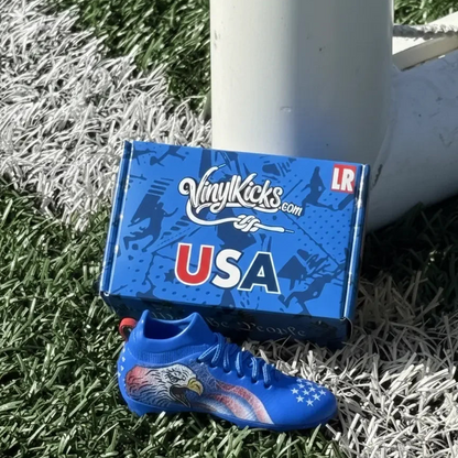 USA collectible miniature soccer shoe with eagle design and bag charm on turf field